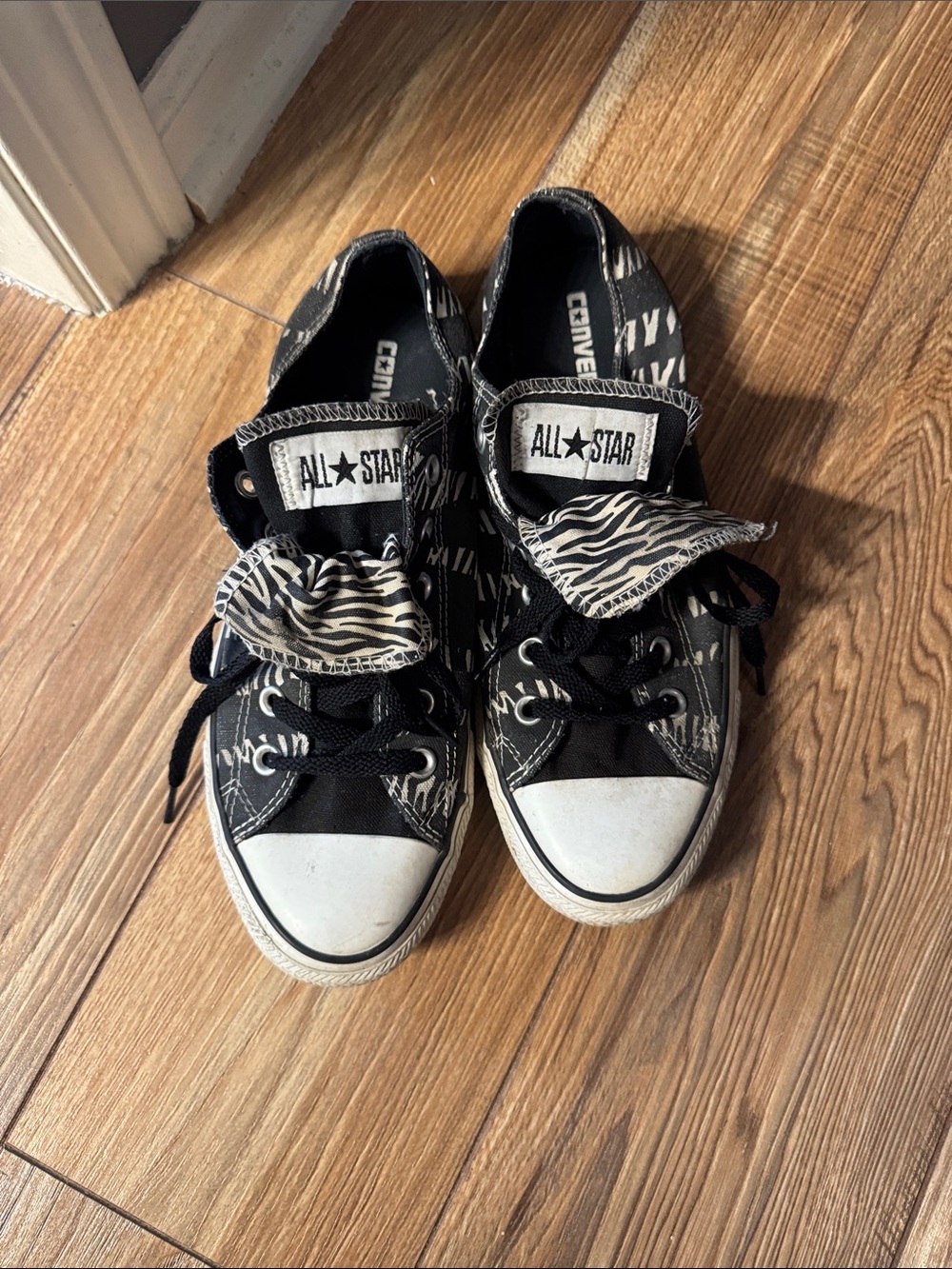 Converse Black Sneakers with White Zebra Accent